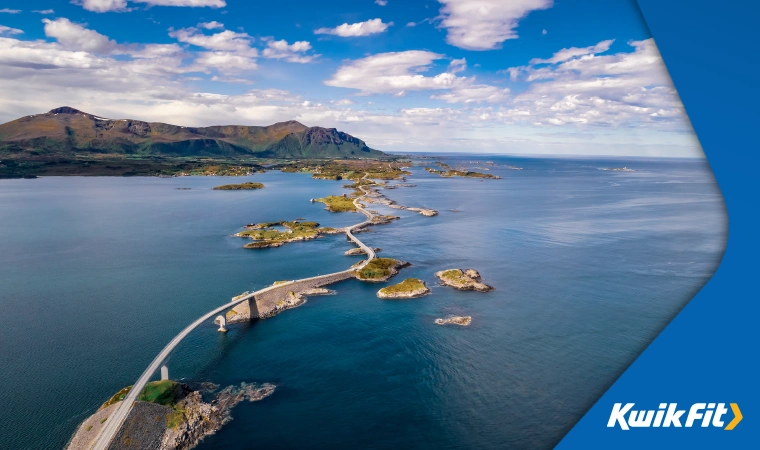 Drone shot of the Atlantic Road, Norway with multiple islets and mountains.