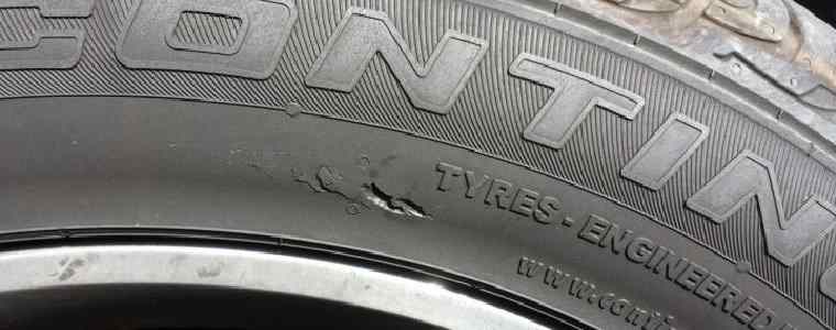 tyre with cut in sidewall