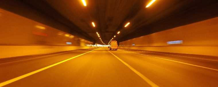 van driving through motorway tunnel