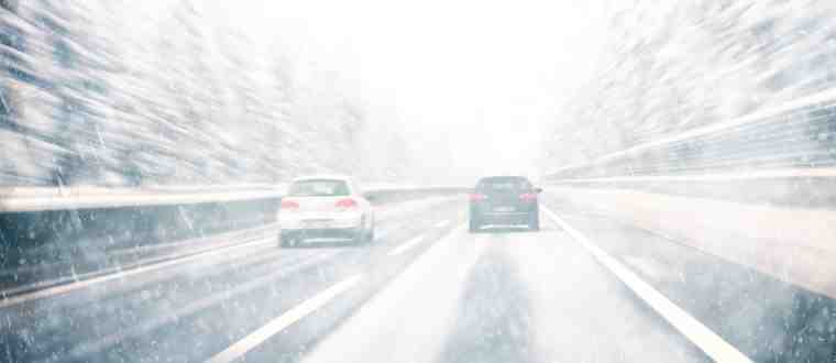 low visibility on snow covered road