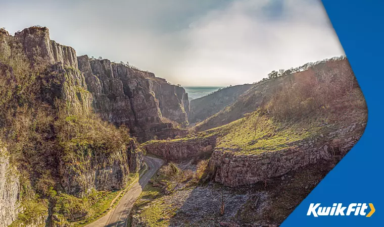 A road through the breathtaking prehistoric cliffs of Cheddar Gorge.
