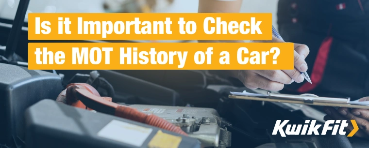Technician Conducting MOT Checks Under a Car Bonnet