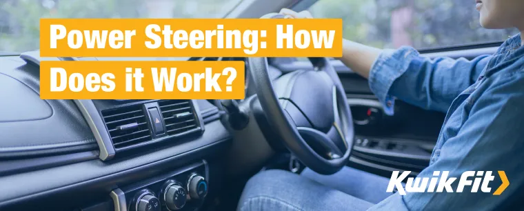 Driver steers a modern car with power steering easily.