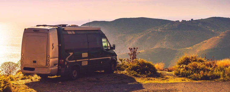 Camper van set up on the mountains