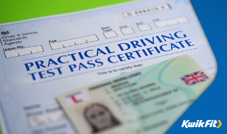 A practical driving test pass certificate with a provisional license.