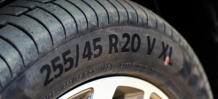 A close-up of the writing on a tyre's sidewall.