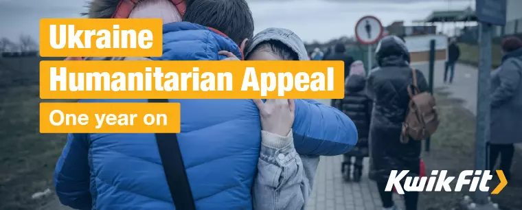 Ukrainian family hugging whilst fleeing the danger of the war - Ukraine Humanitarian Appeal, One year on.
