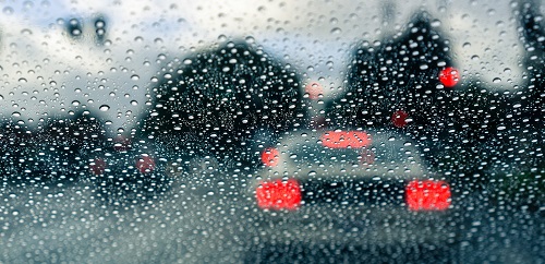 Car on road in rain 