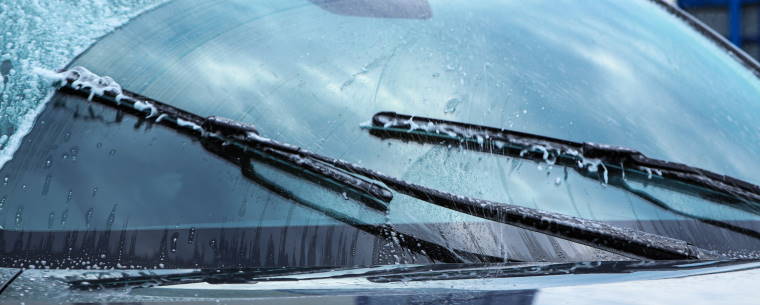 Wipers clearing wiper fluid off of a windscreen