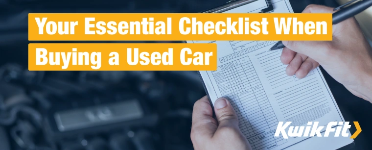 Person ticking off checklist for a car.