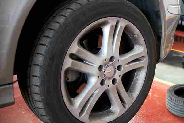 A car wheel having the condition, security, tyre size and type and tread depth checked during an MOT test